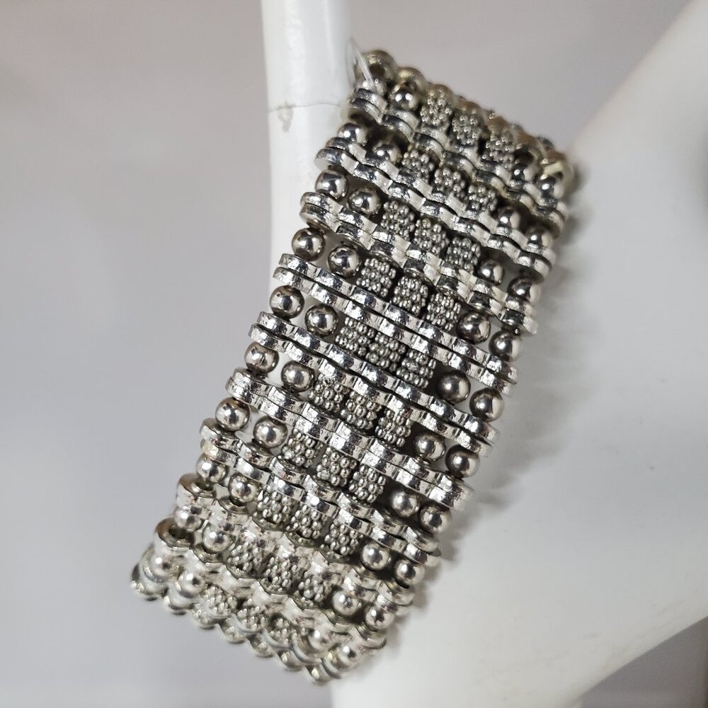 Dee Cee silver tone stretch bracelet  wide, multi-component parts